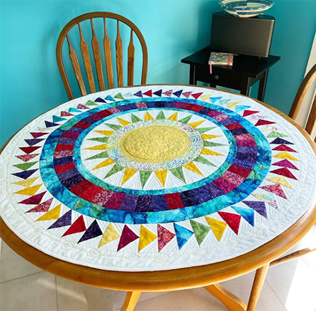 Wendy Norman Whether you love New York Beauties or not, this quilt is sure to please! We love the stunning table topper Wendy designed using EQ8, don't you?! See more of Wendy's work on her Instagram, @wendellmakes