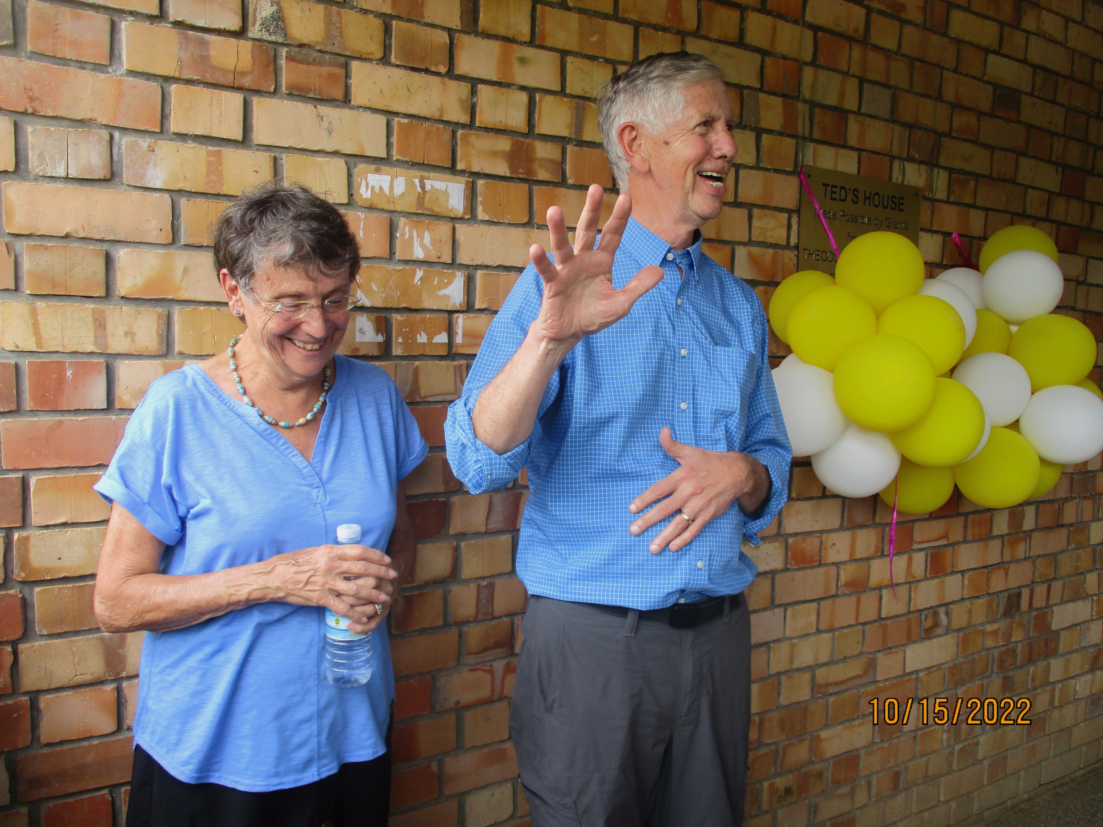 Dana and Kathryn Hiscock participating in the dedication of Ted's House, the Secondary School boys' dormitory. 